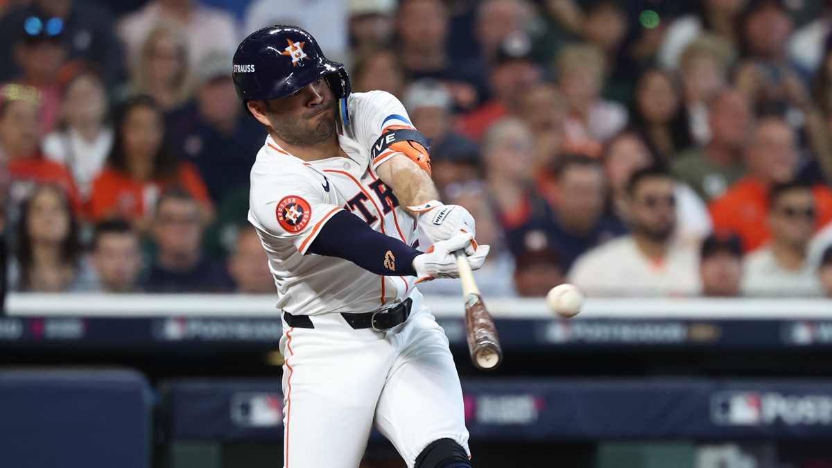 Houston Astros second base Jose Altuve (27) hits a single in the third inning against the Detroit Tigers in game one of the Wild Card round for the 2024 MLB Playoffs at Minute Maid Park.