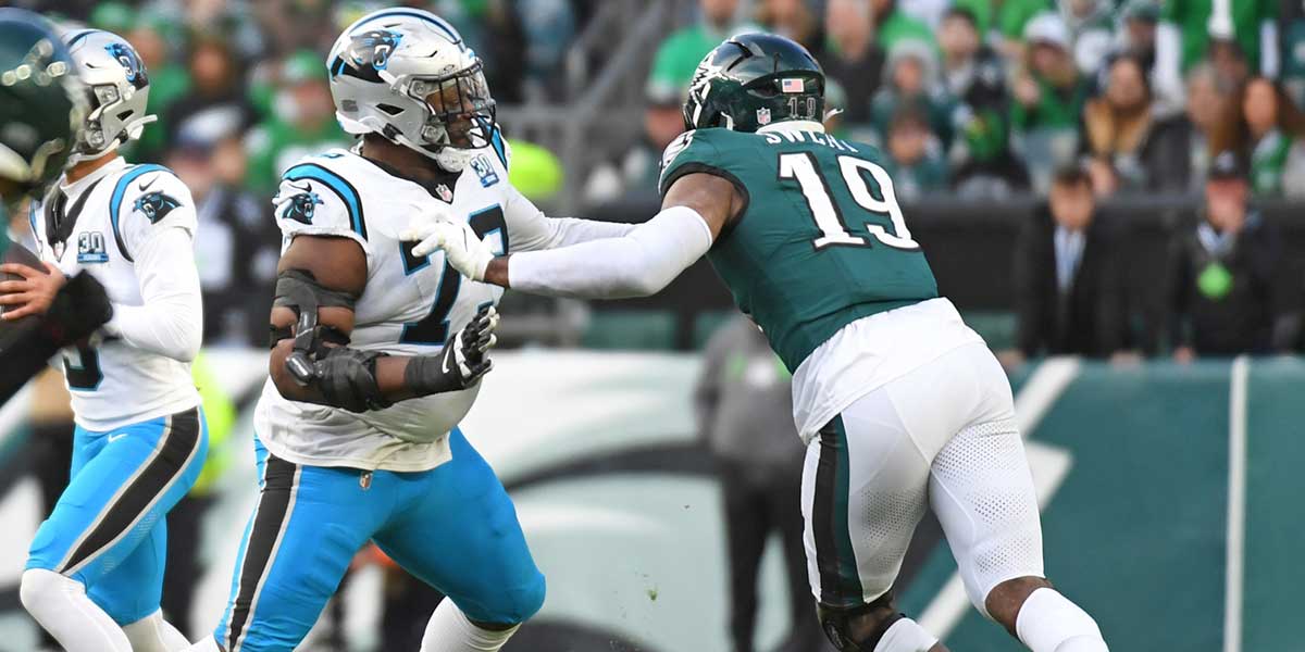 Carolina Panthers offensive tackle Brandon Walton (73) blocks Philadelphia Eagles linebacker Josh Sweat (19) at Lincoln Financial Field. 