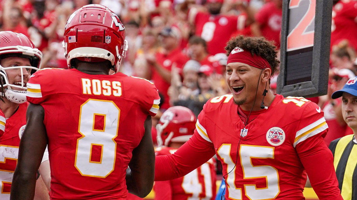 Aug 26, 2023; Kansas City, Missouri, USA; Kansas City Chiefs wide receiver Justyn Ross (8) celebrates with quarterback Patrick Mahomes (15) scoring a touchdown against the Cleveland Browns during the first half at GEHA Field at Arrowhead Stadium. 