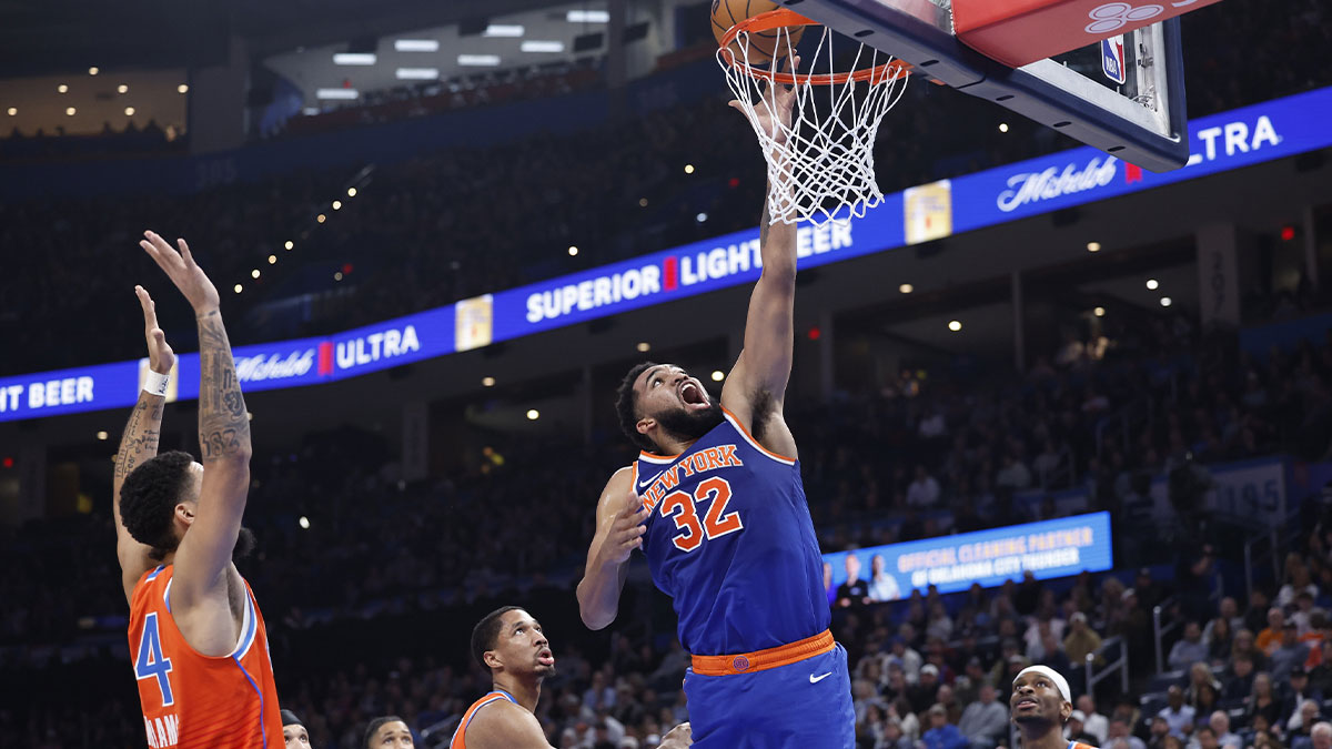 New York Knicks center Karl-Anthony Towns (32) shoots against the Oklahoma City Thunder during the second quarter at Paycom Center.