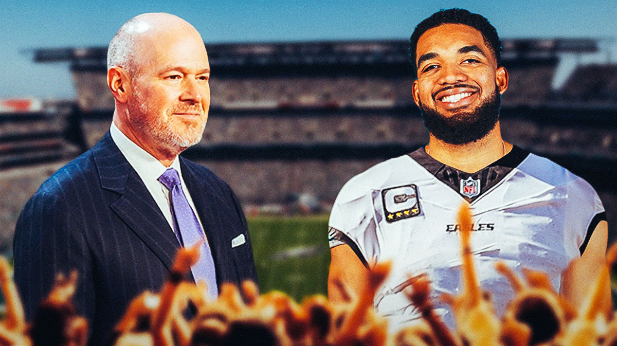 Karl-Anthony Towns in an Eagles jersey. Rich Eisen next to him.