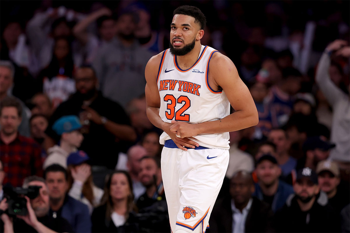 January 13, 2025; New York, New York, USA; New York Knicks center Karl-Anthony Towns (32) reacts during the third quarter against the Detroit Pistons at Madison Square Garden.