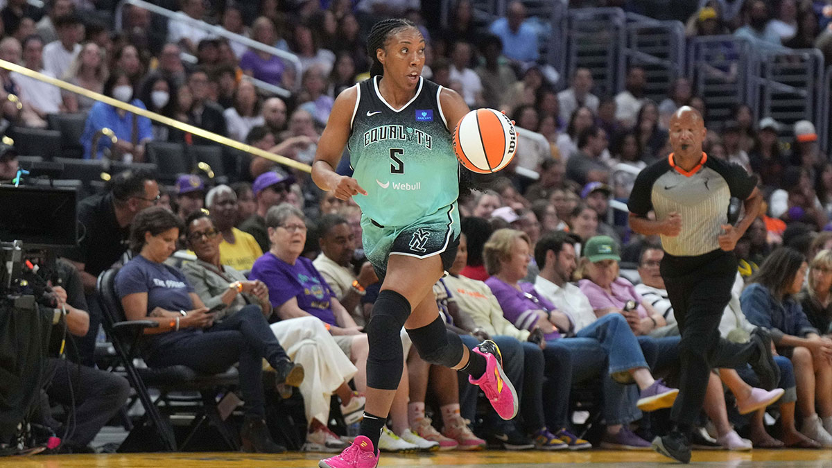 New York Liberty forward Kayla Thornton (5) dribbles the ball against the LA Sparks in the first half at Crypto.com Arena.
