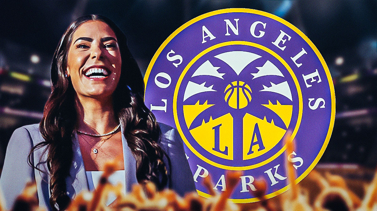 Kelsey Plum next to Sparks logo