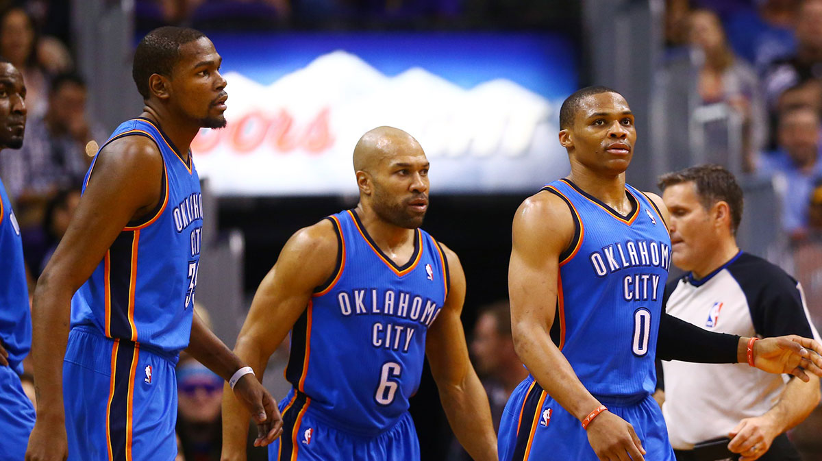 Oklahoma City Thunder forward Kevin Durant (left), guard Derek Fisher (center) and guard Russell Westbrook against the Phoenix Suns at US Airways Center. The Suns defeated the Thunder 122-115. 