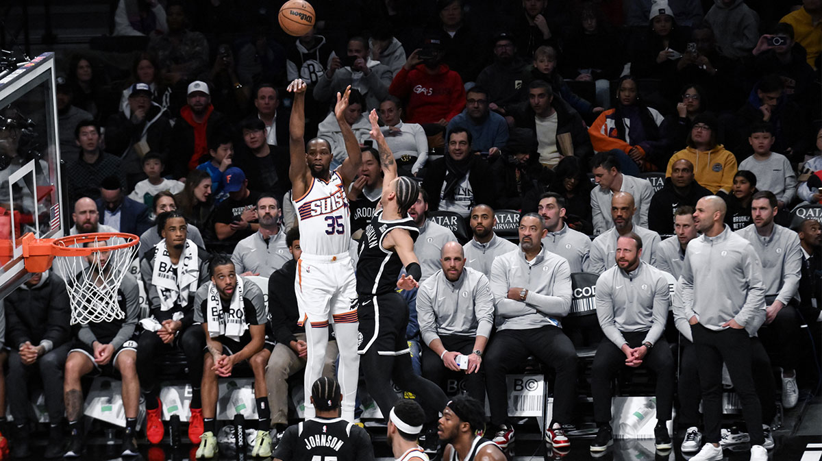 Phoenix Suns forward Kevin Durant (35) shoots the ball as Brooklyn Nets forward Jaylen Wilson (22) defends during the first half at Barclays Center.