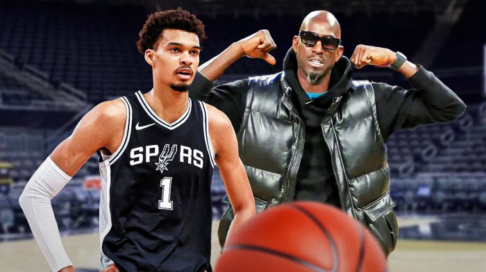 San Antonio Spurs star Victor Wembanyama and Kevin Garnett in front of Frost Bank Center.