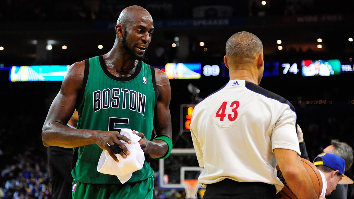 Boston Celtics power forward Kevin Garnett (5) argues with referee Dan Crawford (43) during the fourth quarter against the Golden State Warriors at ORACLE Arena. The Warriors defeated the Celtics 101-83.