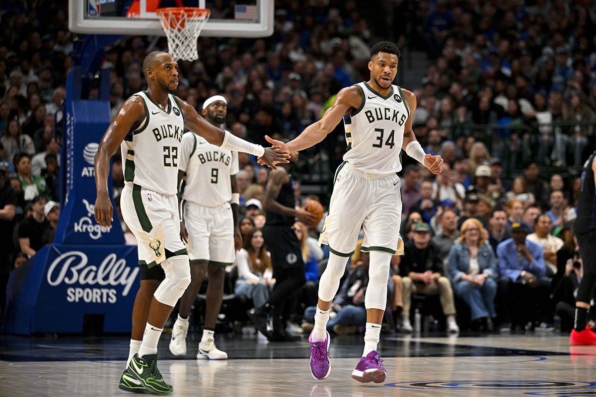 Milvaukee Bucks Next Khris Middleton (22) and Giannis Antetokounpo (34) celebrates during the second quarter against Dallas Mavericks in the center of American Airlines.