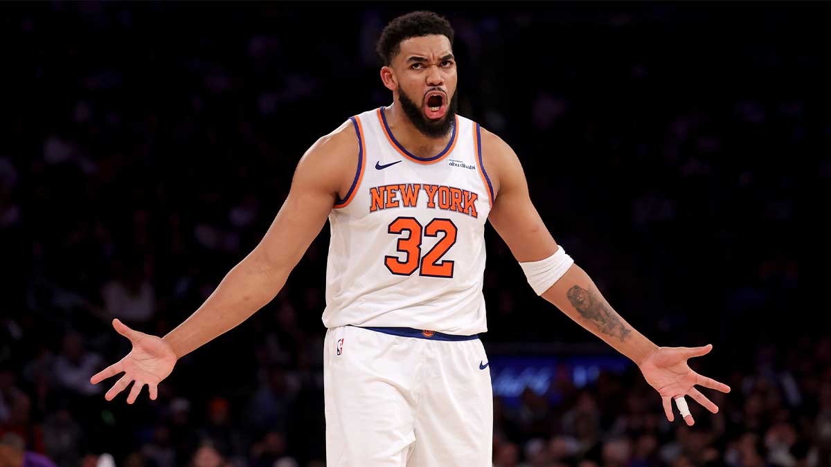 New York Knicks center Karl-Anthony Towns (32) reacts during the third quarter against the Toronto Raptors at Madison Square Garden. 