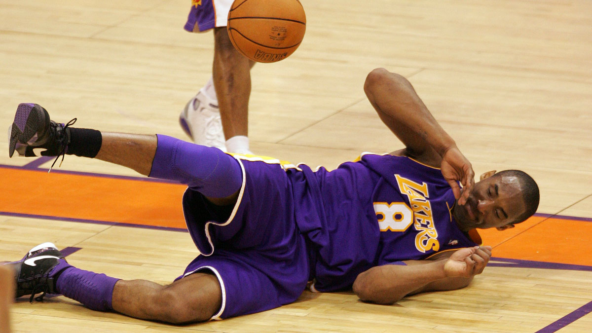 Phoenix Suns player Raja Bell (19) fouls Los Angeles Lakers player Kobe Bryant in the 4th quarter of game 5 in the first round of the NBA playoffs at US Airways Center.