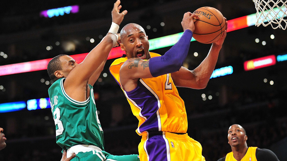 Los Angeles Lakers shooting guard Kobe Bryant (24) grabs a rebound against the Boston Celtics during the first half at Staples Center.