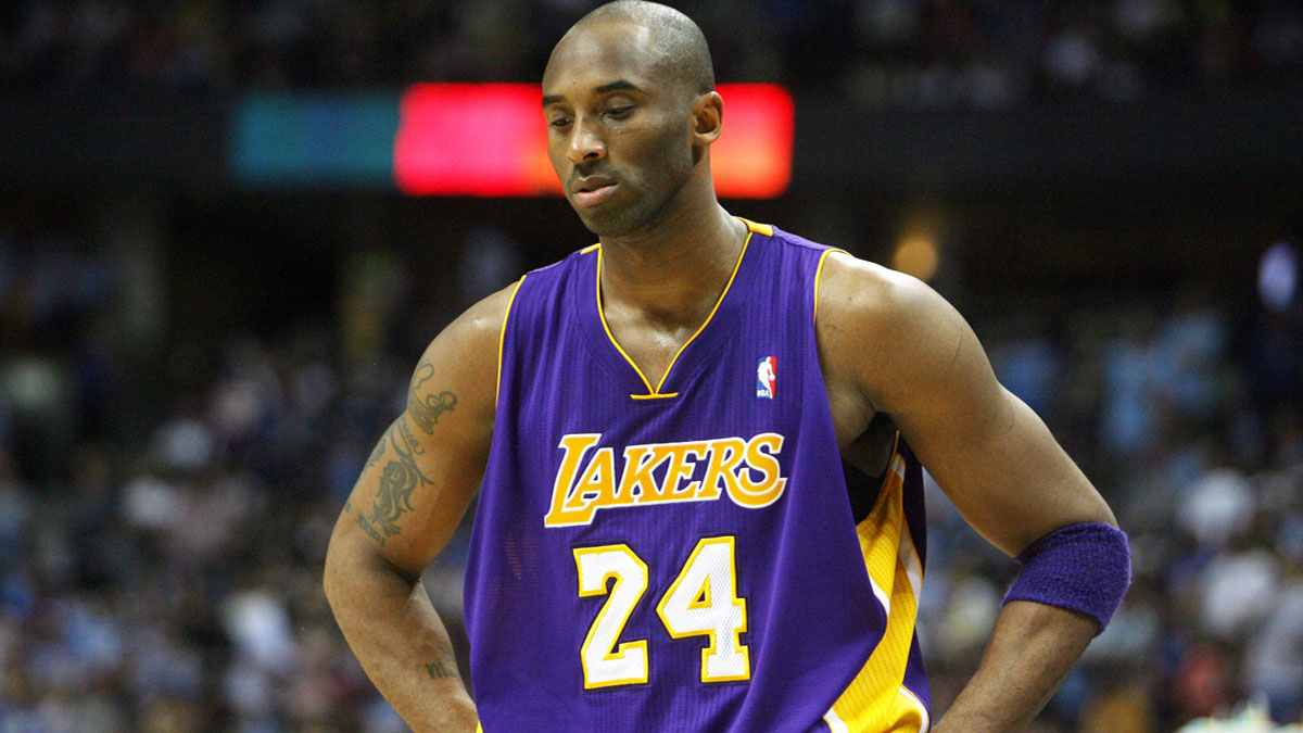 Los Angeles Lakers guard Kobe Bryant (24) reacts during the second half of game six in the Western Conference quarterfinals of the 2012 NBA Playoffs against the Denver Nuggets at the Pepsi Center.  The Nuggets won 113-96. 