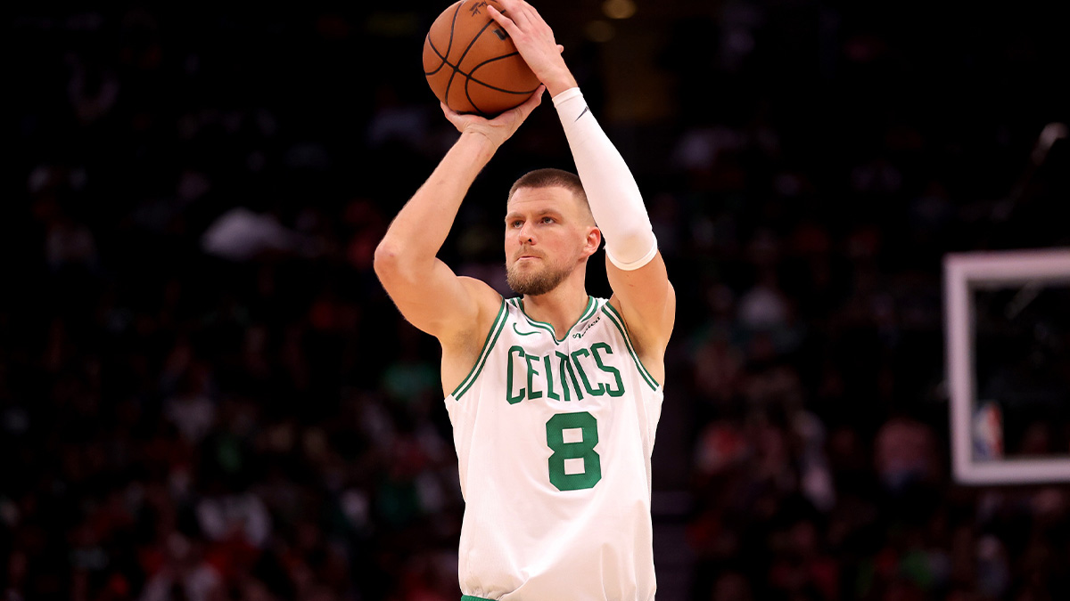 Boston Celtics center Kristaps Porzingis (8) shoots outside against the Houston Rockets during the fourth quarter at Toyota Center.