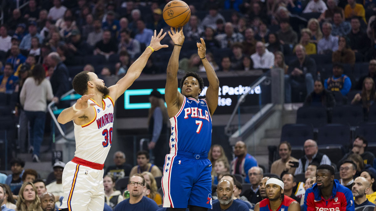 Philadelphia 76ers guard Kyle Lowry (7) takes a three-point shot over Golden State Warriors guard Stephen Curry (30) during the first quarter at Chase Center. 
