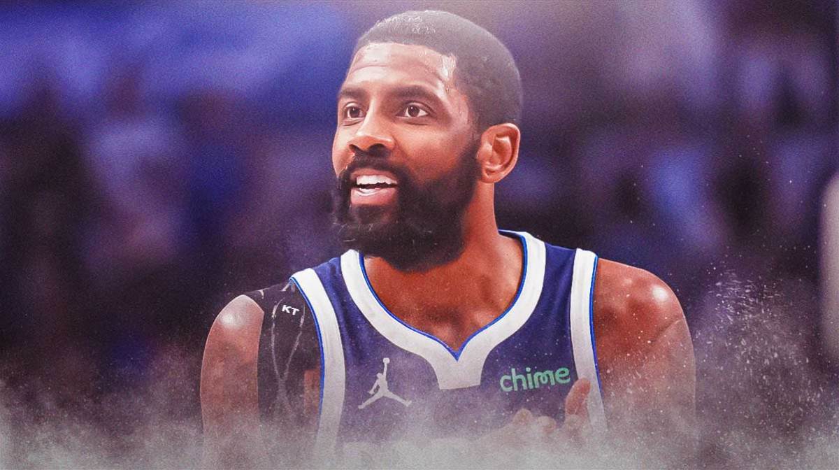 Mavericks' Kyrie Irving smiling and celebrating
