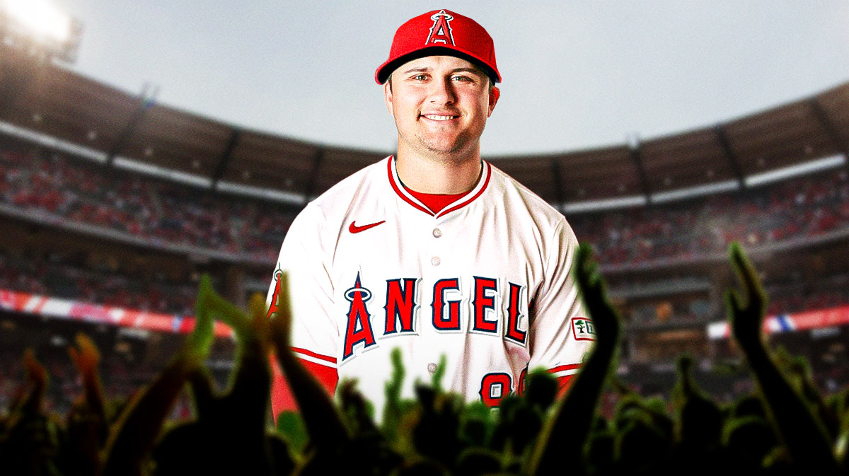 MLB player JD Davis in a Los Angeles Angels 2024 jersey. Angel Stadium background.