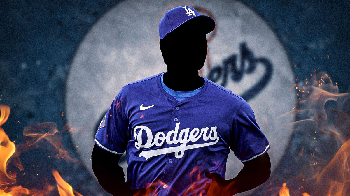 A silhouette in the center with the Los Angeles Dodgers logo behind it, surrounded by fire.