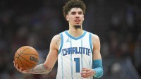 Charlotte Hornets guard LaMelo Ball (1) brings the ball up court in the second quarter against the Cleveland Cavaliers at Rocket Mortgage FieldHouse.