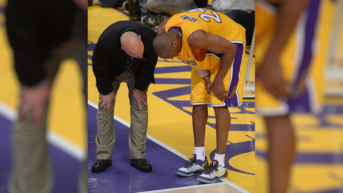 Kobe Bryant from the Lakers injured his left knee in the first half against the Golden State Warriors on 4/12/2013.