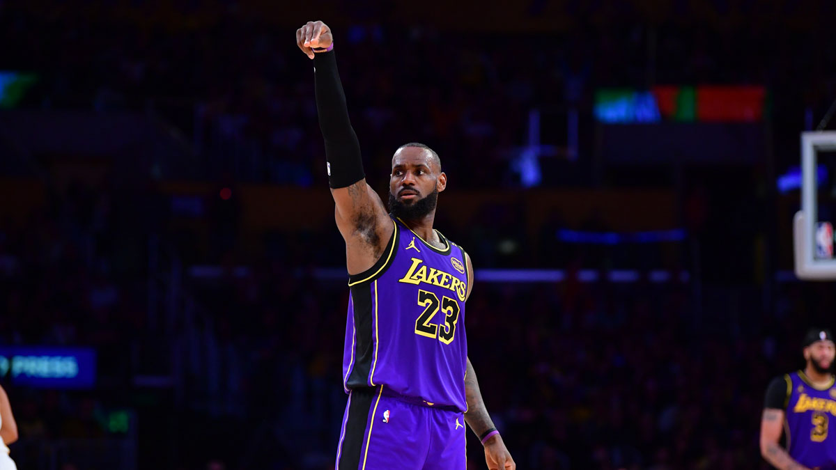 Los Angeles Lakers forward LeBron James (23) reacts after scoring three point basket against the Atlanta Hawks during the second half at Crypto.com Arena.