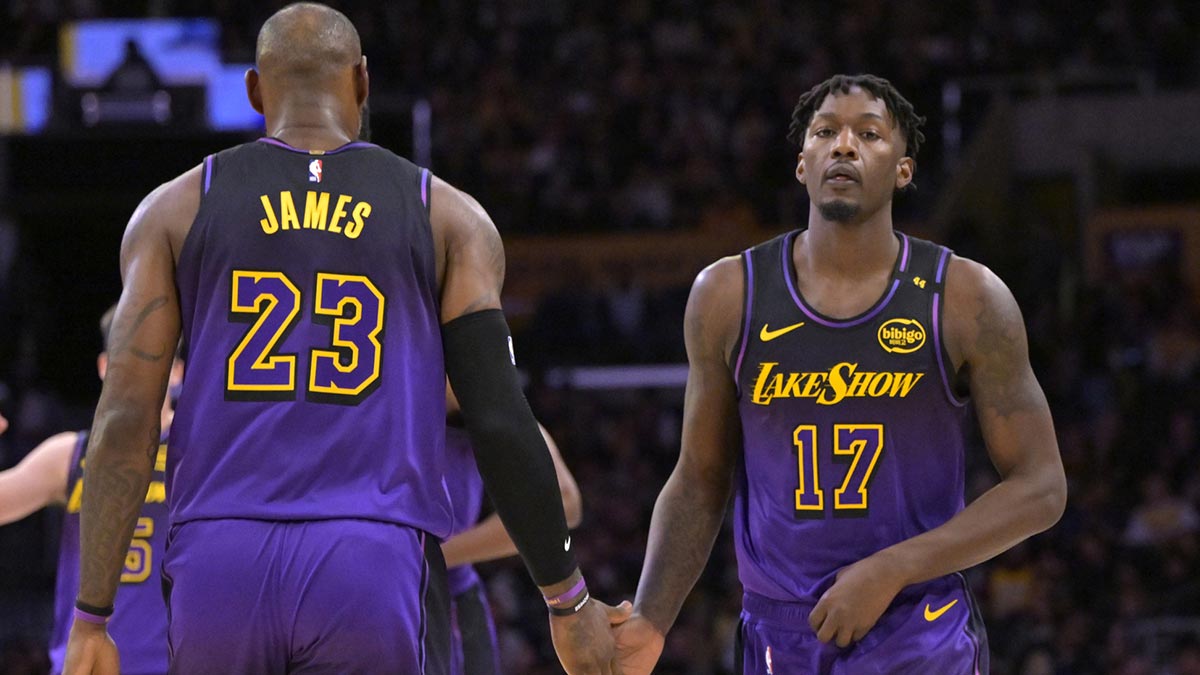 Lakers forward Dorian Finney-Smith (17) replaces forward LeBron James (23) in the game.