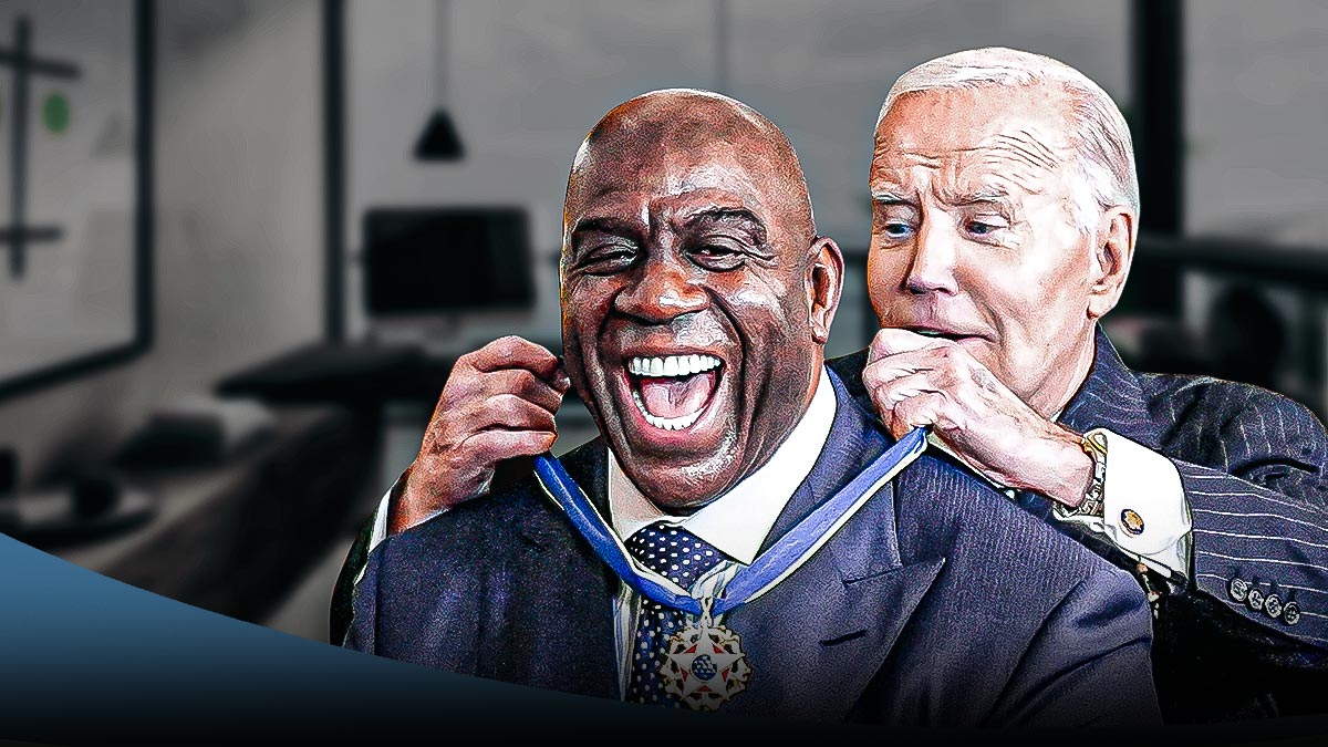 Magic Johnson with the Presidential Medal of Freedom next to Joe Biden