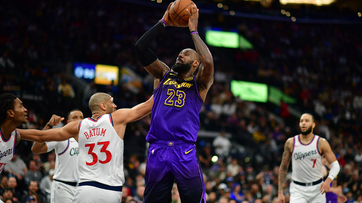 Los Angeles Lakers forward LeBron James (23) drives to the basket against Los Angeles Clippers forward Nicolas Batum (33) during the second half at the Intuit Dome. 