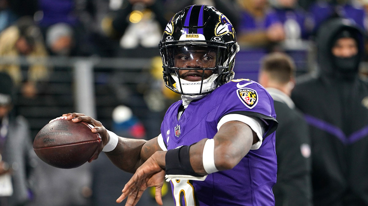 Baltimore Ravens quarterback Lamar Jackson (8) warms up before an AFC wild card game against the Pittsburgh Steelers at M&T Bank Stadium.