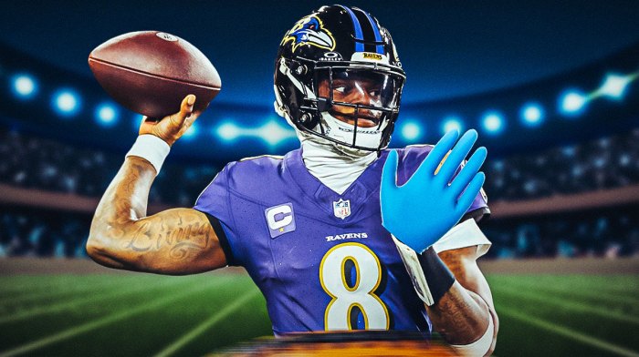 Lamar Jackson with big gloves on his hands.
