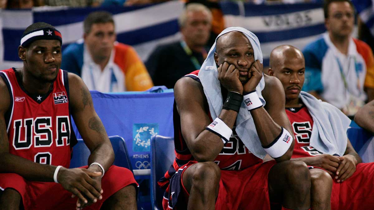 Lebron James, Lamar Odom, and Stephon Marburi sit on the bench during the 2004 Olympic Games. Years.