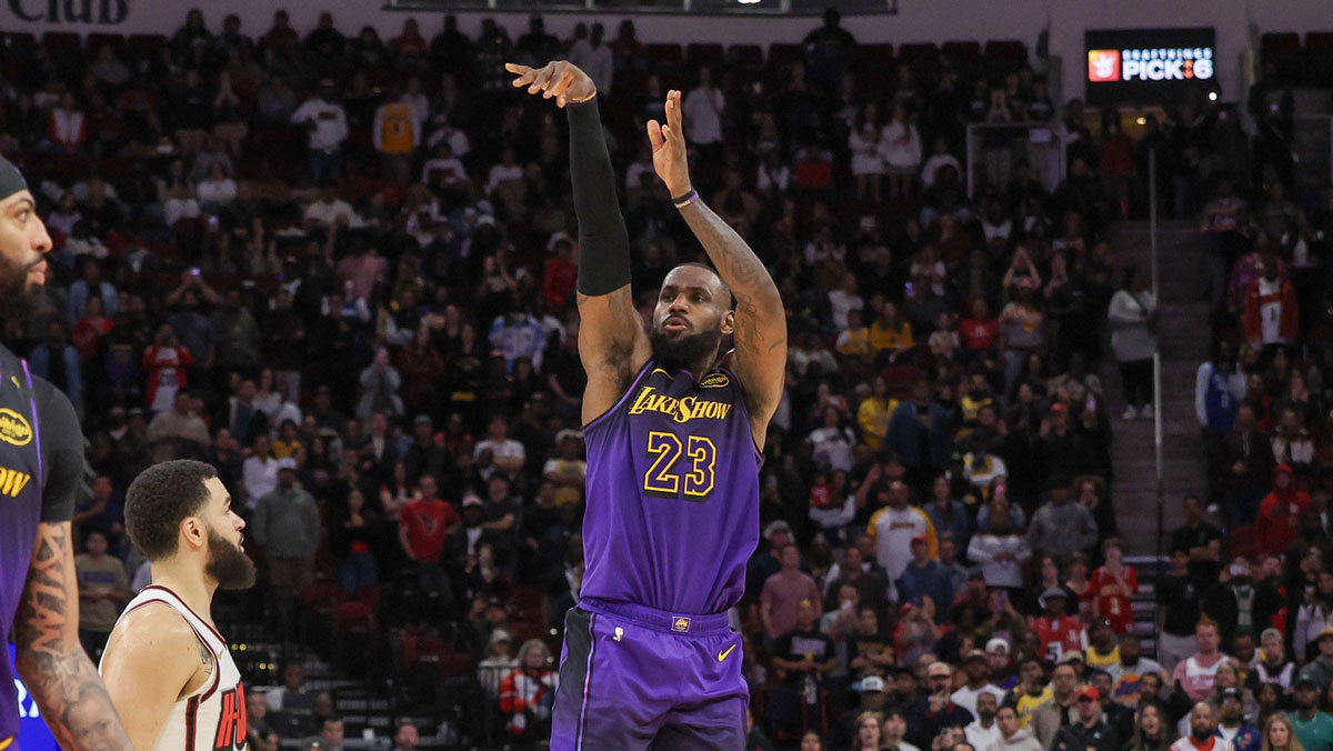 Los Angeles Lakers forward LeBron James (23) makes a shot to tie the game but the shot was nullified because forward Anthony Davis (3) fouled Houston Rockets guard Aaron Holiday (0) in the last second of the fourth quarter at Toyota Center.