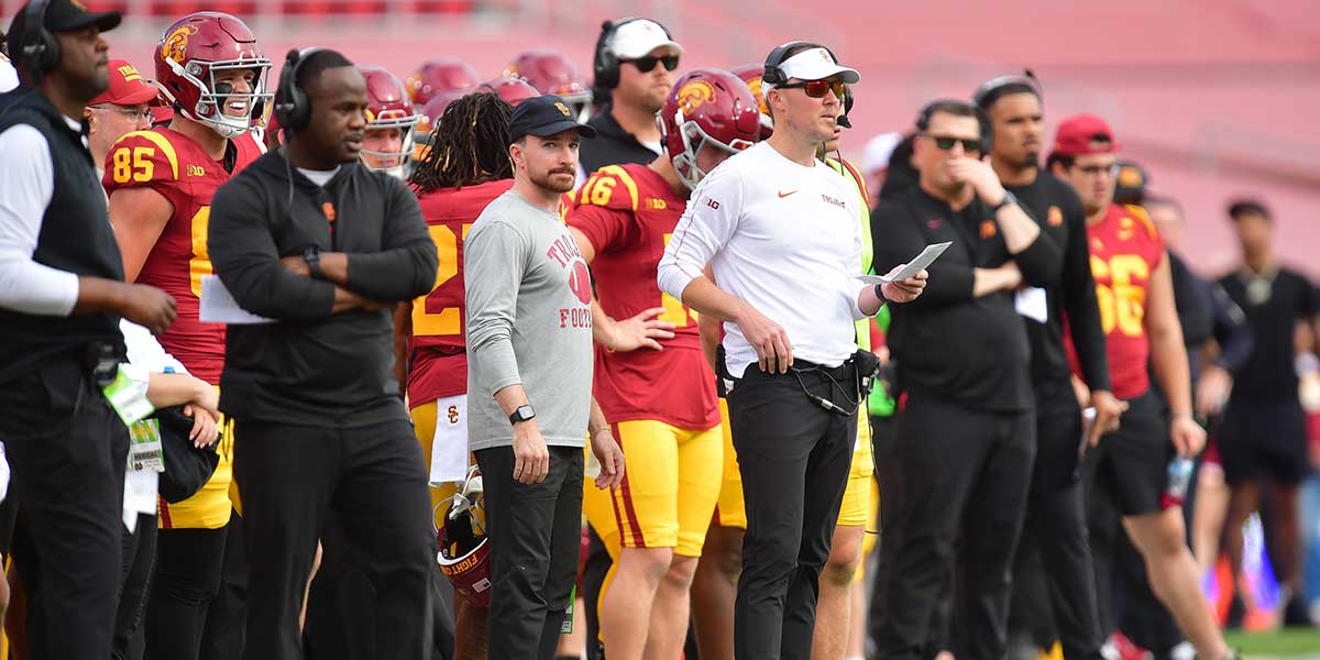 Nov 30, 2024; Los Angeles, California, USA; Southern California Trojans head coach Lincoln Riley watches game action against the Notre Dame Fighting Irish during the first half at the Los Angeles Memorial Coliseum.