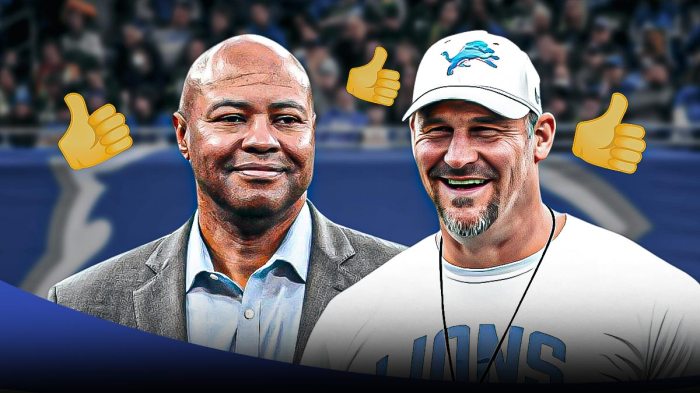 Lions head coach Dan Campbell with former Stanford coach David Shaw with a couple thumbs up emojis.