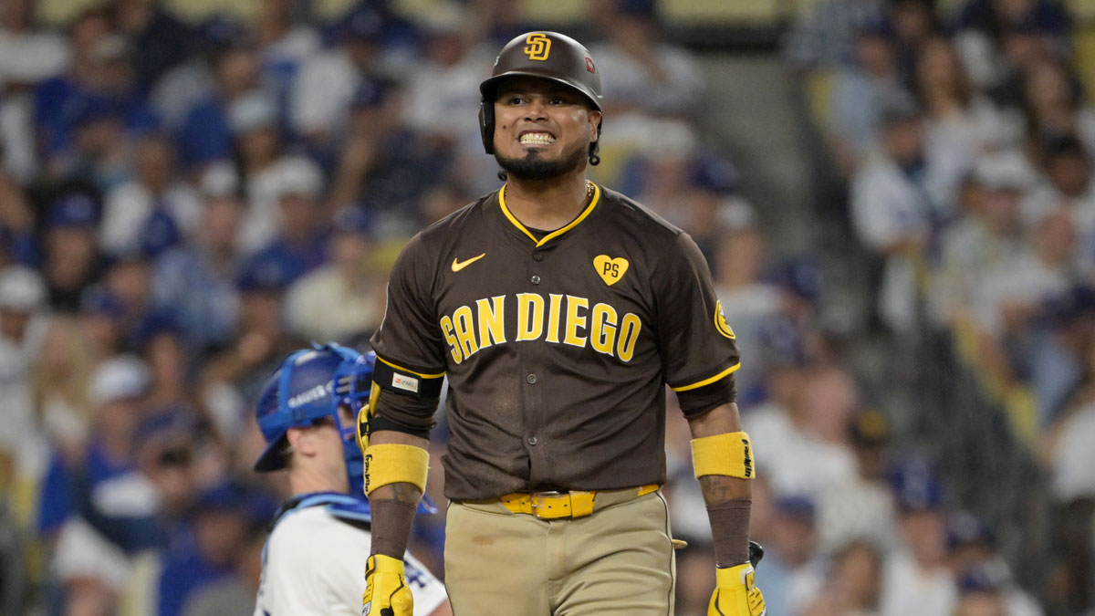 San Diego Padres first baseman Luis Arraez (4) reacts at bat in the sixth inning against the Los Angeles Dodgers during game five of the NLDS for the 2024 MLB Playoffs at Dodger Stadium.