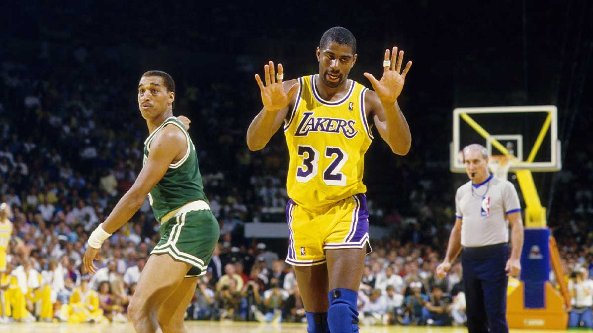 Los Angeles Lakers Guard Magic Johnson (32) Reacies like Boston Celtics Guard Dennis Johnson Points on the forum.