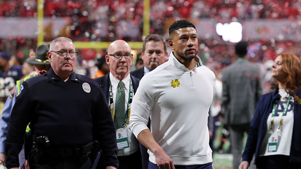 Notre Dame Fighting Irish head coach Marcus Freeman reacts after losing against the Ohio State Buckeyes in the CFP National Championship college football game at Mercedes-Benz Stadium.