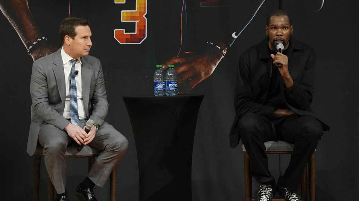 Phoenix Suns owner Matt Ishbia and forward Kevin Durant speak to the media at the Footprint Center.