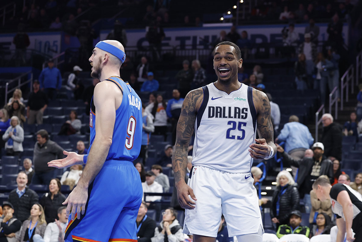 Mavericks forward PJ Washington (25) smiles after a game against Oklahoma City Thunder guard Alex Caruso (9) during the second half at Pike Center