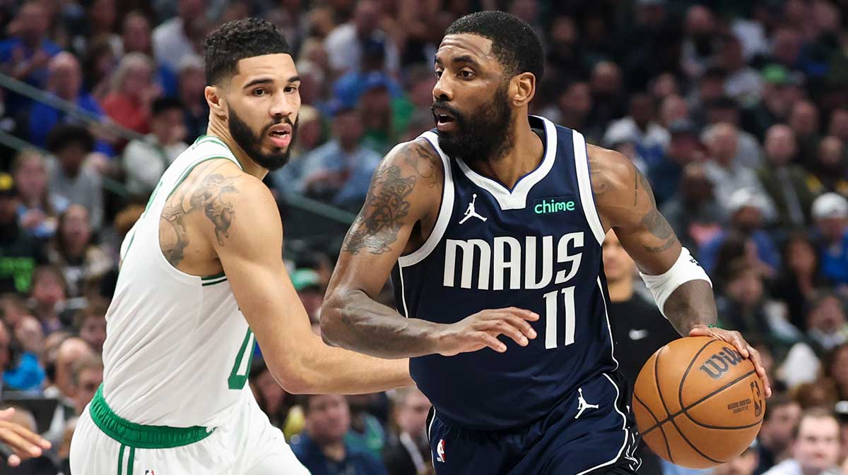 Mavericks Guard Kirie Irving (11) Drive to Cart as Boston Celtics Next Jaison Tatum (0) During the first half in the center of Airlines Airlines.