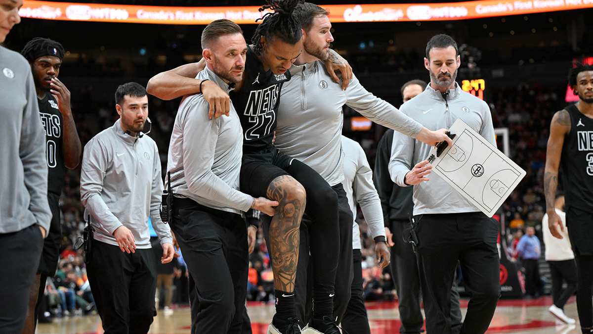 Brooklyn Networks Next Maxwell Levis (27) takes place off the floor after they suffer injuries from Toronto Raptor in the second half in Scotiabank Arena.