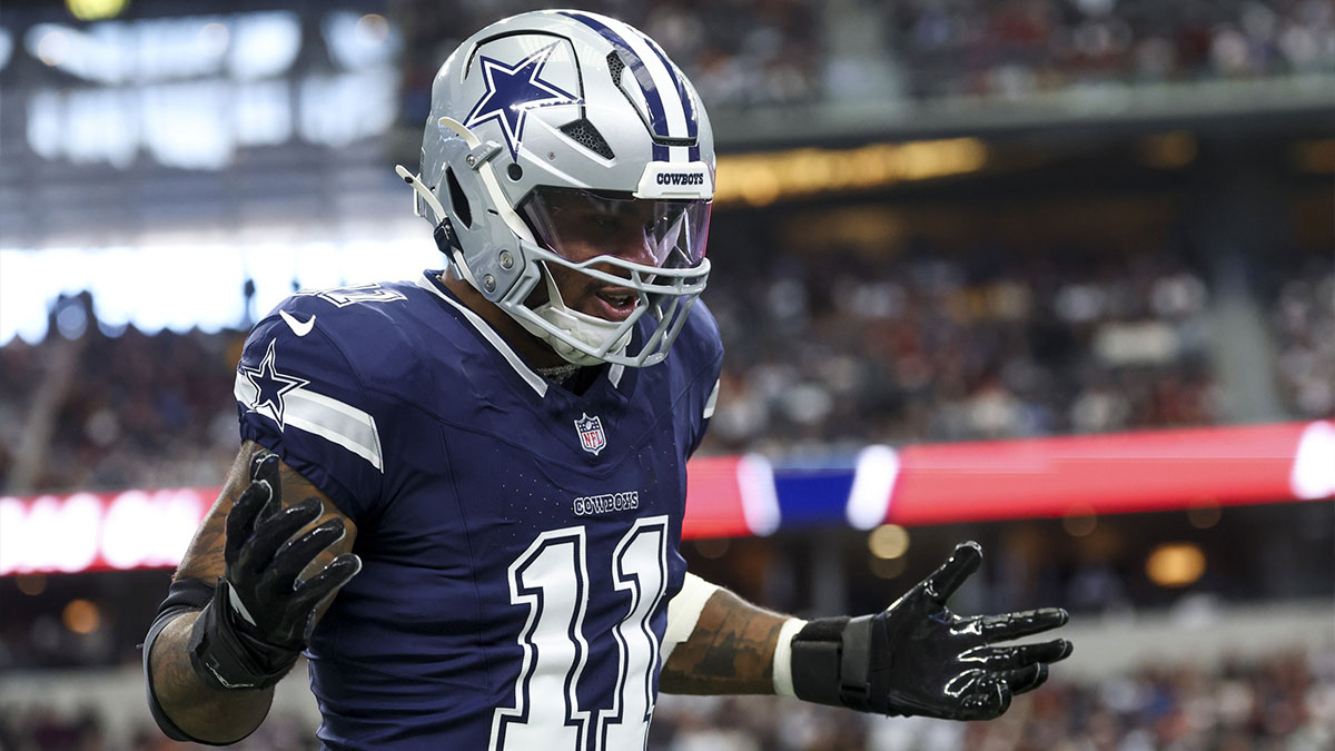 Dallas Cowboys linebacker Micah Parsons (11) celebrates after a sack during the first quarter against the Washington Commanders at AT&T Stadium.