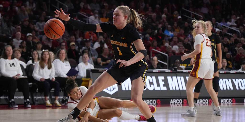 Michigan Wolverines guard Olivia Olson (1) reaches for the ball against the Southern California Trojans.