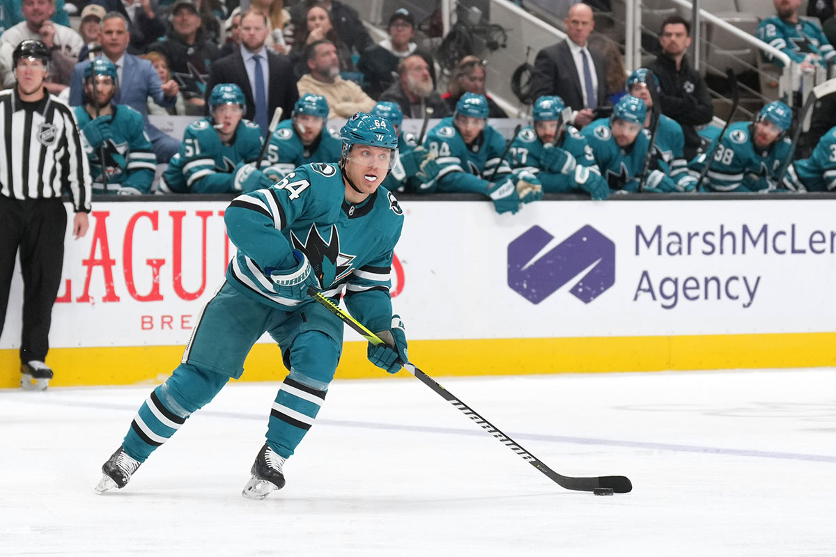 San Jose Sharks center Mikael Granlund (64) skates with the puck against the New Jersey Devils during the second period at SAP Center at San Jose.