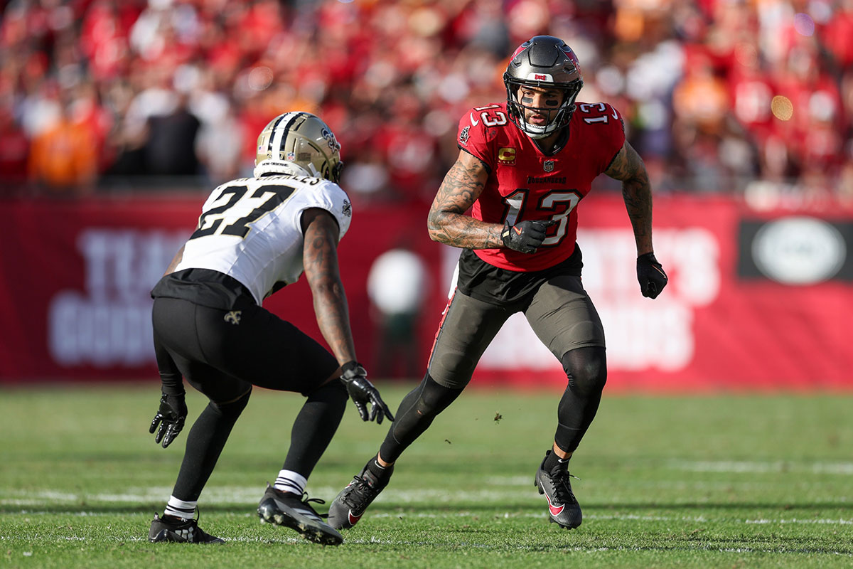 Tampa Bay Buccaneers wide receiver Mike Evans (13) runs a route guarded by New Orleans Saints cornerback Shemar Jean-Charles (27) in the fourth quarter at Raymond James Stadium.