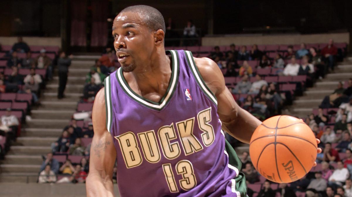 Milwaukee Bucks guard Mike James (13) with the ball against the New Jersey Nets at Continental Airlines Arena. 