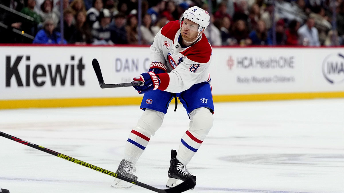 Montreal Canadiens defenseman Mike Matheson (8) shoots on goal against the Colorado Avalanche in the first period at Ball Arena.