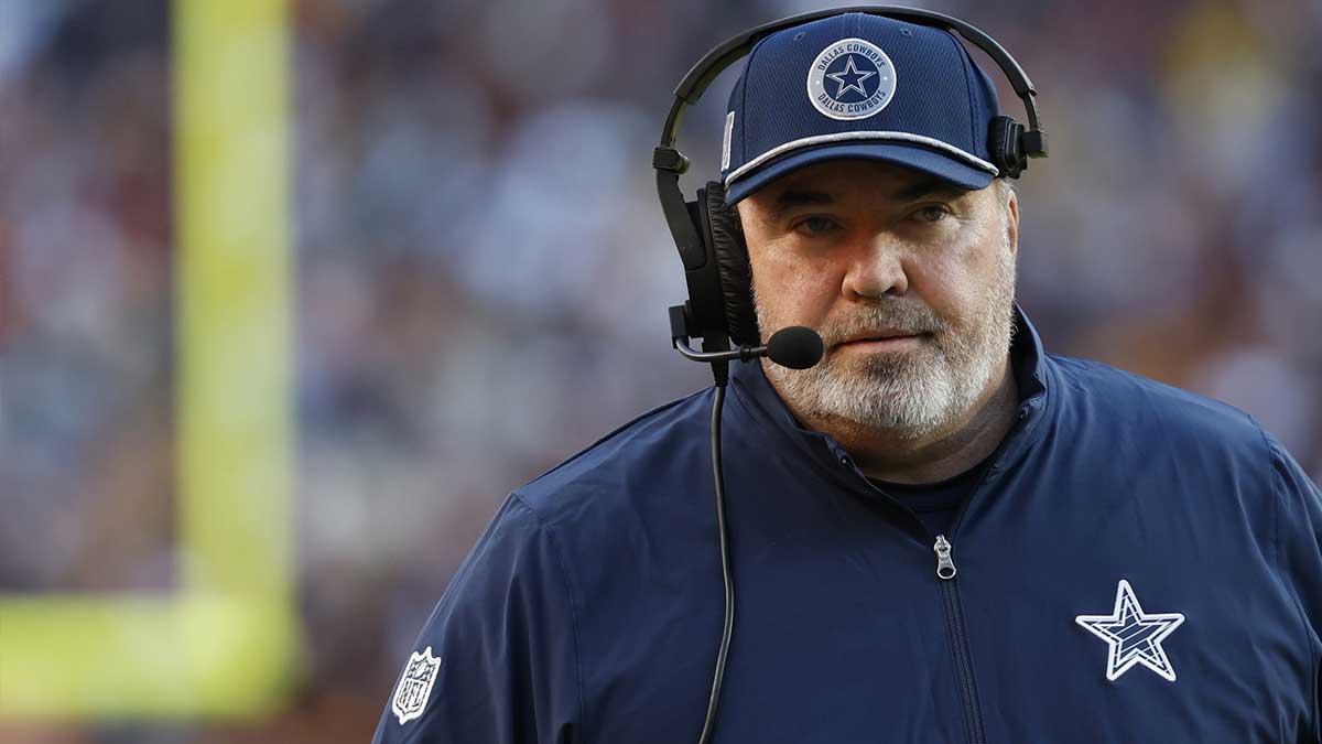 Dallas Cowboys coach Mike McCarthy stands on the sidelines against the Washington Commanders during the third quarter at Northwest Stadium. 