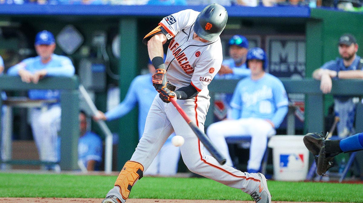 San Francisco Giants right fielder Mike Yastrzemski (5) hits a foul ball during the fourth inning against the Kansas City Royals at Kauffman Stadium.