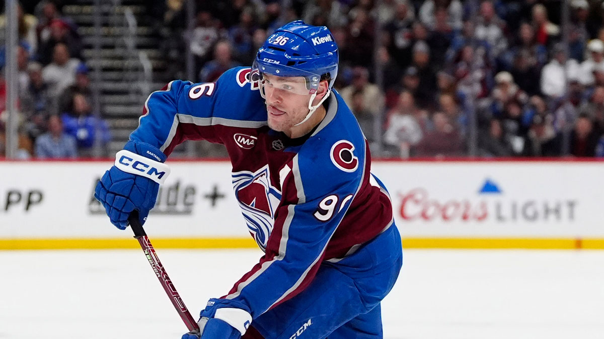 Colorado Avalanche right wing Miko Rantanen (96) shoots the puck in the second period against the New York Rangers at Ball Arena.